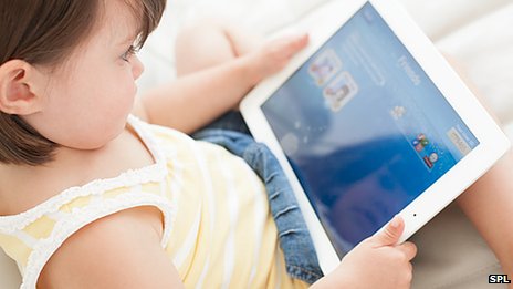 toddler using tablet